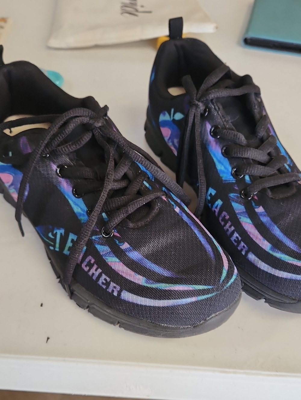 Skechers Women’s Black Athletic Sneakers with Iridescent Blue-Purple Accents